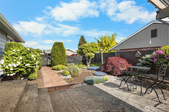 5502 N 21st St, Tacoma, WA 98406 - fenced backyard with a patio area and outdoor dining space