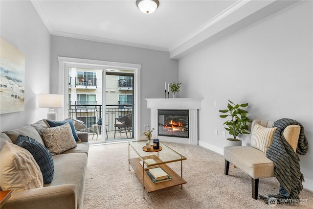 1015 Railroad Ave Unit 415, Bellingham, WA 98225 - living area featuring ornamental molding, carpet, a glass covered fireplace, and baseboards