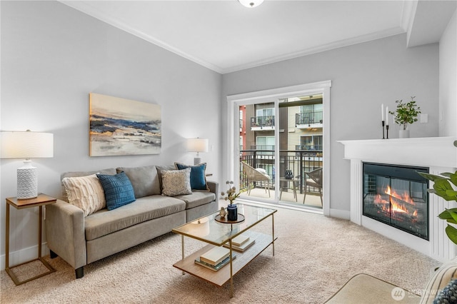1015 Railroad Ave Unit 415, Bellingham, WA 98225 - carpeted living area with crown molding, a glass covered fireplace, and baseboards