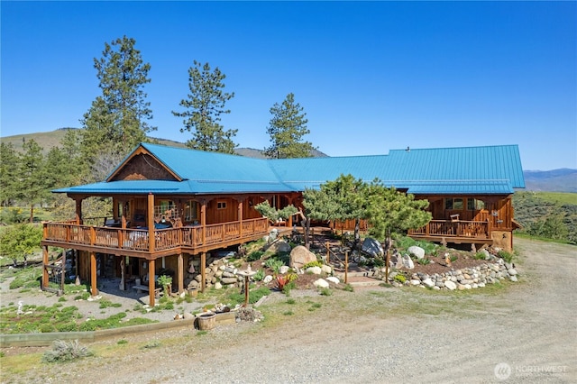 117 Vintin Rd, Carlton, WA 98814 - view of front of property featuring a deck with mountain view and metal roof