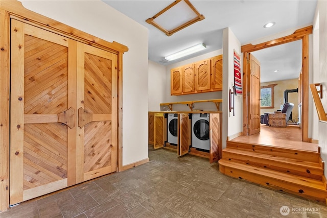 117 Vintin Rd, Carlton, WA 98814 - washroom featuring washer and dryer, attic access, cabinet space, and baseboards