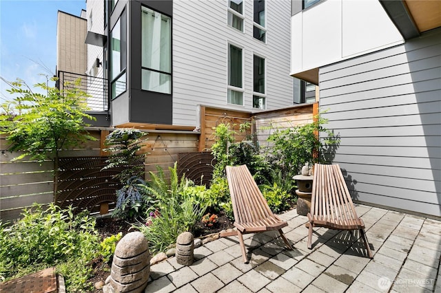 916NW 56th St Unit G, Seattle, WA 98107 - view of patio / terrace featuring fence