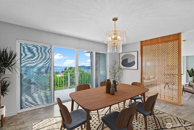 7618 19th St W, Tacoma, WA 98466 - dining area with a chandelier and a textured ceiling