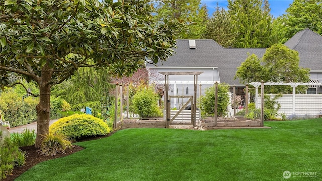 1241 Cherry Ave NE, Bainbridge Island, WA 98110 - view of front of home with a shingled roof, a pergola, and a garden
