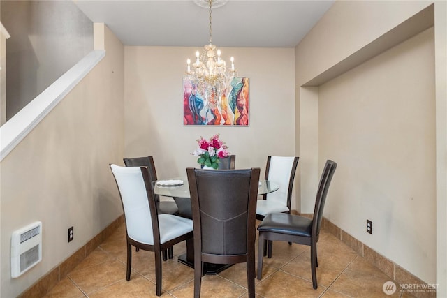 15150 140th Way SE Unit V104, Renton, WA 98058 - dining room featuring a chandelier, heating unit, tile patterned flooring, and baseboards