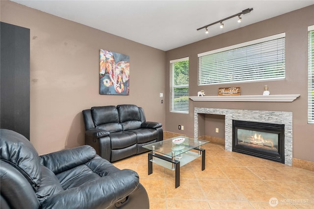 15150 140th Way SE Unit V104, Renton, WA 98058 - tiled living room with a glass covered fireplace