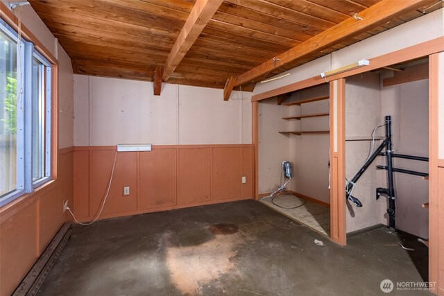 140 Sunstone Rd, Packwood, WA 98361 - basement with wood ceiling, healthy amount of natural light, and a wainscoted wall