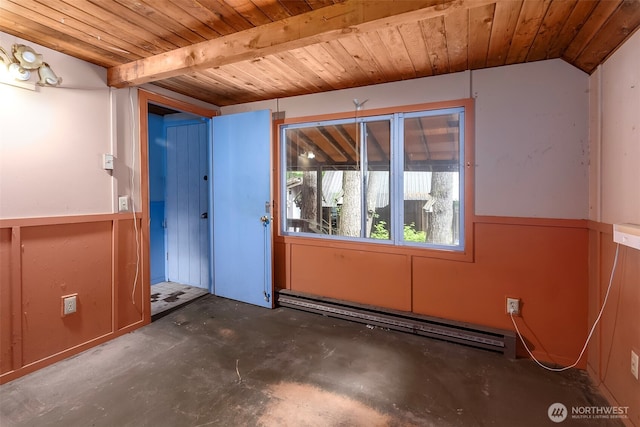 140 Sunstone Rd, Packwood, WA 98361 - unfurnished room with a baseboard heating unit, wooden ceiling, and concrete floors