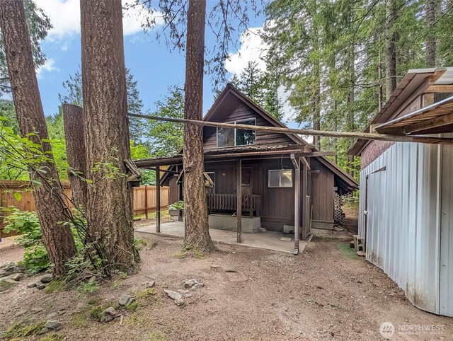 140 Sunstone Rd, Packwood, WA 98361 - rear view of property with a patio and fence
