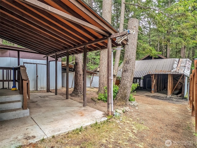 140 Sunstone Rd, Packwood, WA 98361 - view of patio with an outdoor structure and fence