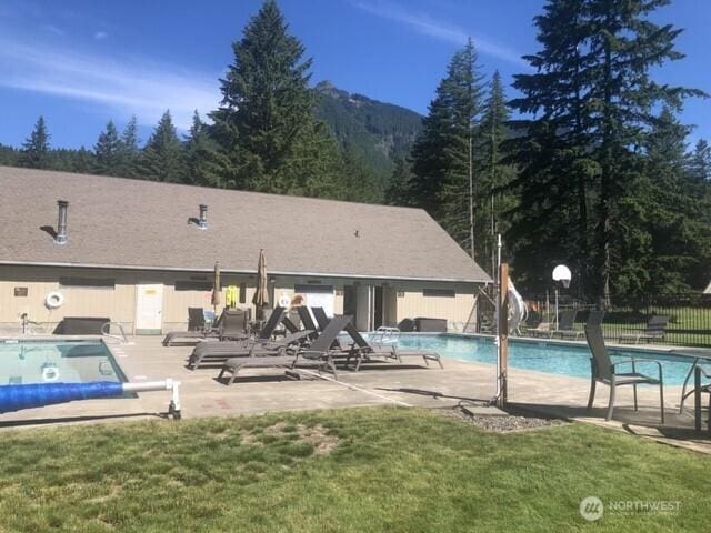 140 Sunstone Rd, Packwood, WA 98361 - community pool featuring a patio area