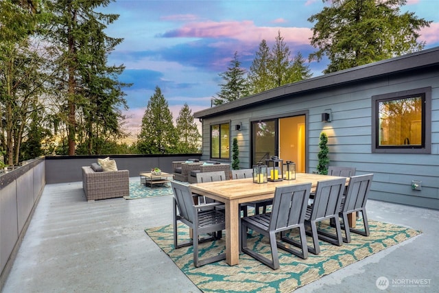 wooden deck with an outdoor living space