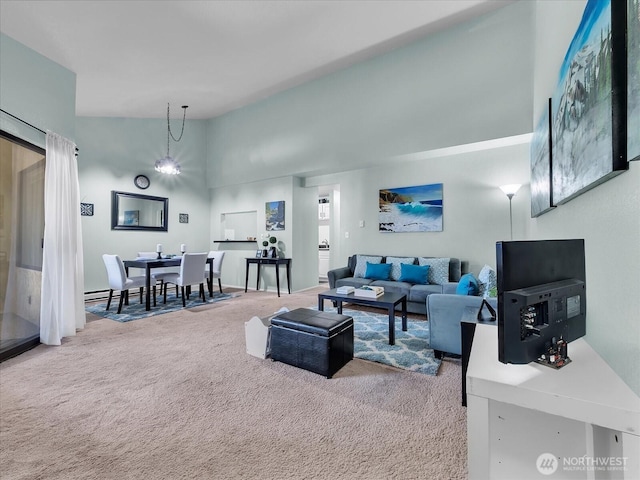 3024 NE 143rd St Unit 304, Seattle, WA 98125 - carpeted living room featuring vaulted ceiling