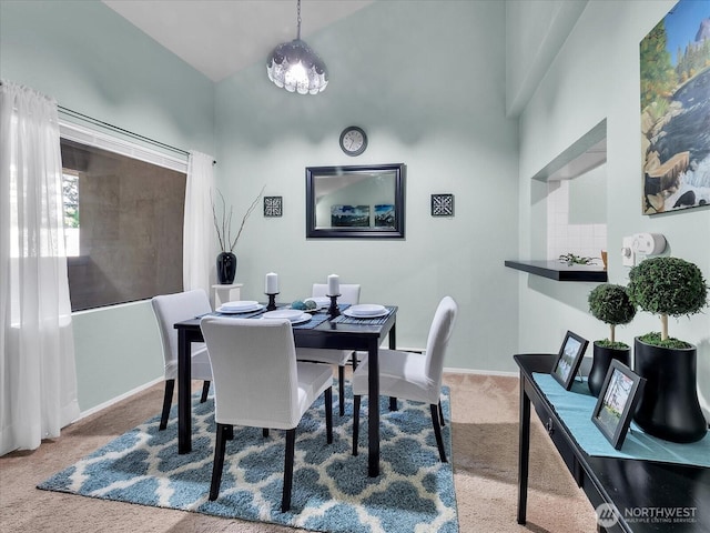 3024 NE 143rd St Unit 304, Seattle, WA 98125 - dining area featuring carpet flooring and baseboards