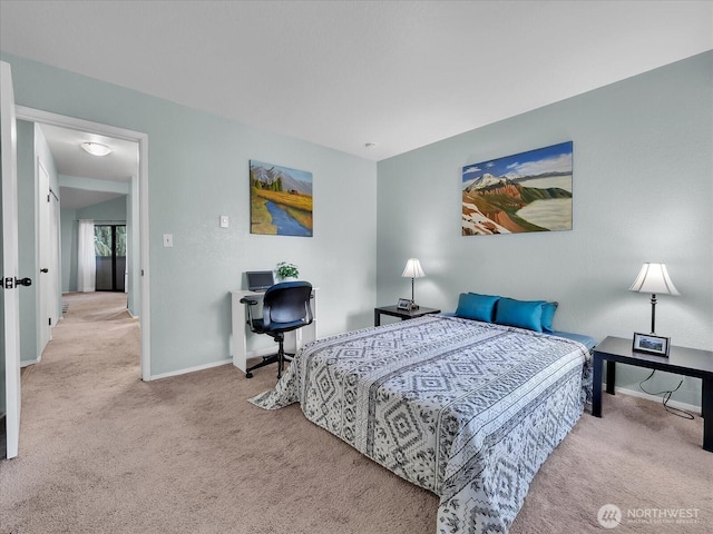 3024 NE 143rd St Unit 304, Seattle, WA 98125 - carpeted bedroom with baseboards and an office area