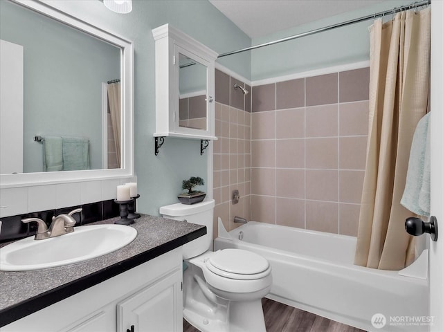 3024 NE 143rd St Unit 304, Seattle, WA 98125 - bathroom with shower / tub combo with curtain, toilet, vanity, and wood finished floors