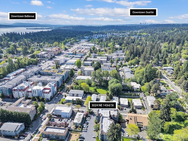3024 NE 143rd St Unit 304, Seattle, WA 98125 - aerial view of property and surrounding area featuring a forest