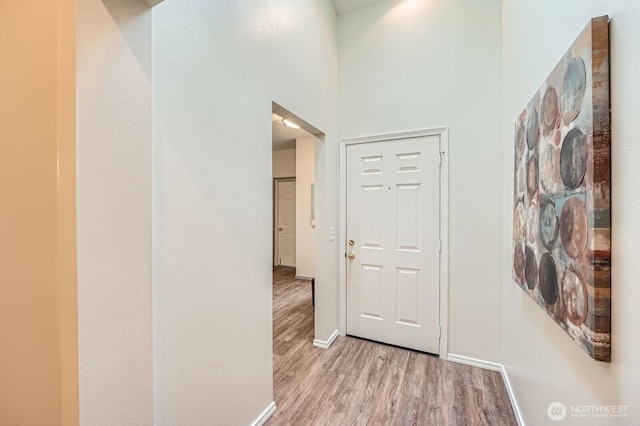 4313 S 220th Pl Unit 18-2, Kent, WA 98032 - hallway featuring light wood-type flooring and baseboards