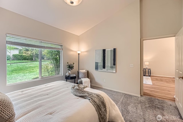4313 S 220th Pl Unit 18-2, Kent, WA 98032 - bedroom with lofted ceiling, carpet, and baseboards