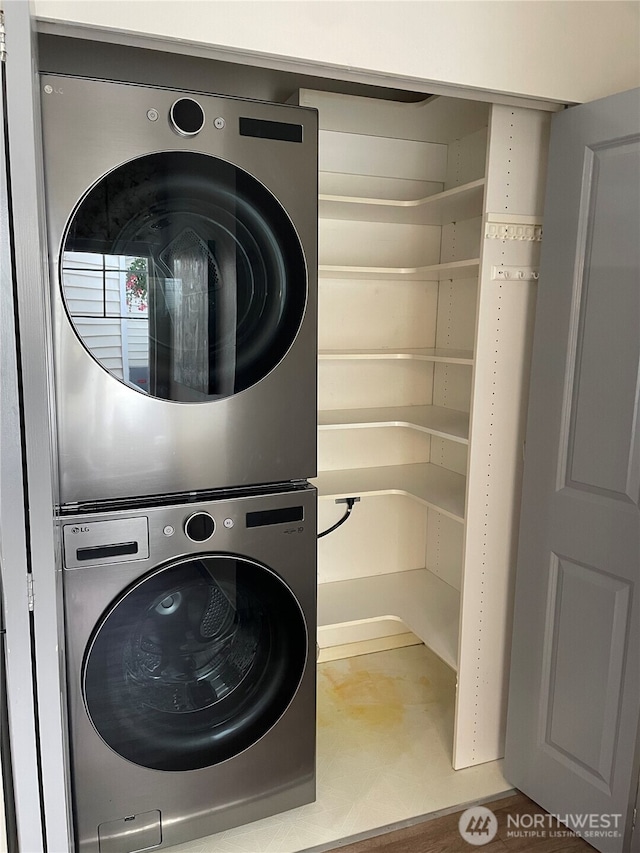 4313 S 220th Pl Unit 18-2, Kent, WA 98032 - washroom featuring stacked washing machine and dryer