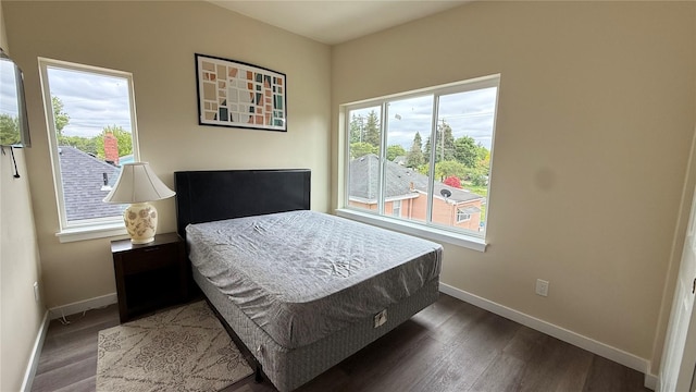 9025 38th Ave S, Seattle, WA 98118 - bedroom with baseboards and wood finished floors