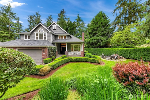 19852 NE 124th Pl, Woodinville, WA 98077 - view of front of home featuring brick siding, a fire pit, covered porch, an attached garage, and a chimney