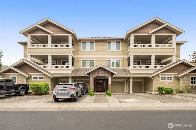 23925 NE 115th Ln Unit 302, Redmond, WA 98053 - townhome / multi-family property with driveway and a garage