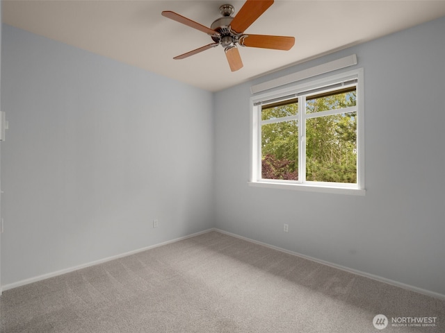 23925 NE 115th Ln Unit 302, Redmond, WA 98053 - empty room with carpet and a ceiling fan
