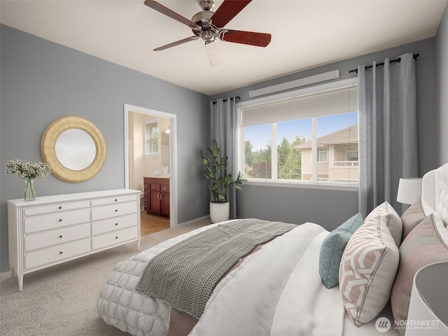 23925 NE 115th Ln Unit 302, Redmond, WA 98053 - bedroom featuring light carpet, ensuite bath, and a ceiling fan