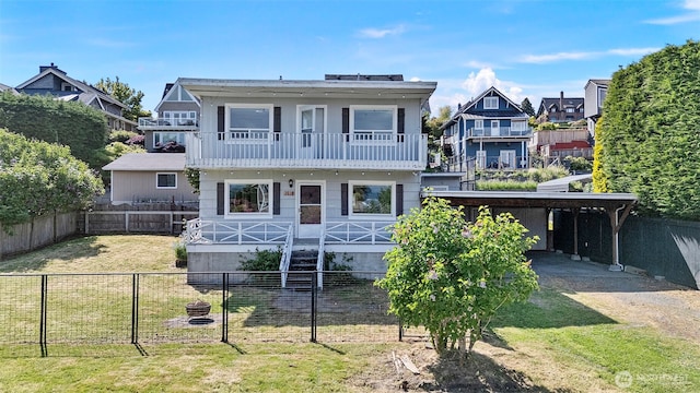 3510 N Puget Sound Ave, Tacoma, WA 98407 - back of property featuring a balcony, a detached carport, and a residential view