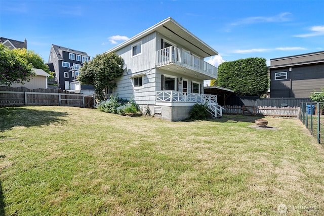 3510 N Puget Sound Ave, Tacoma, WA 98407 - back of property featuring a balcony and an outdoor fire pit