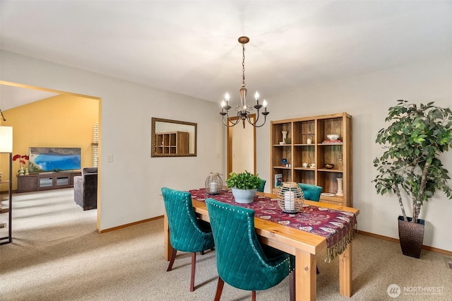 6206 SW Tiger Tail Dr, Olympia, WA 98512 - dining area featuring a chandelier, carpet flooring, and baseboards