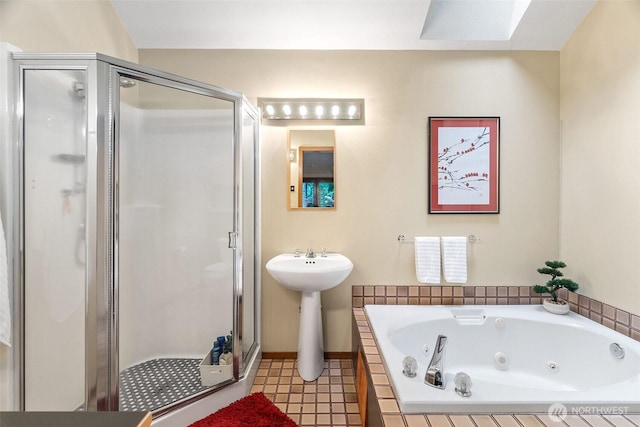 6206 SW Tiger Tail Dr, Olympia, WA 98512 - bathroom with a shower stall, a whirlpool tub, a skylight, baseboards, and a sink