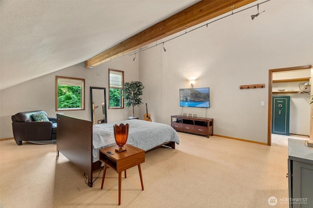 6206 SW Tiger Tail Dr, Olympia, WA 98512 - carpeted bedroom featuring vaulted ceiling and baseboards