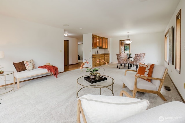 living room with light carpet