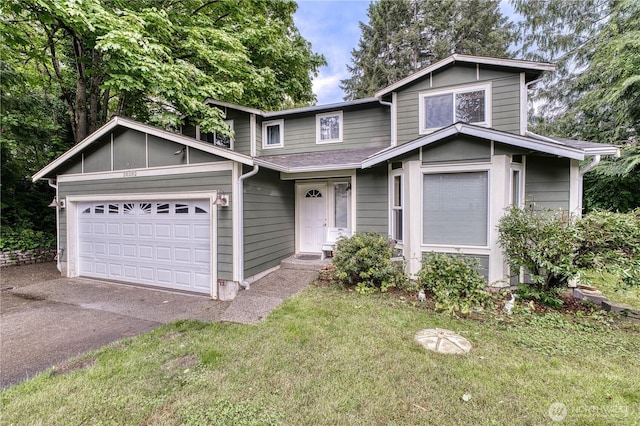 20282 NW Cedar Ln, Poulsbo, WA 98370 - traditional-style home featuring driveway, a garage, and a front yard
