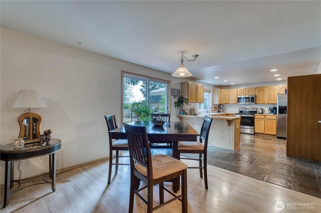 20282 NW Cedar Ln, Poulsbo, WA 98370 - dining space with baseboards and recessed lighting