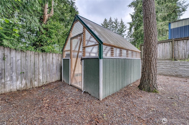 20282 NW Cedar Ln, Poulsbo, WA 98370 - view of greenhouse with a fenced backyard