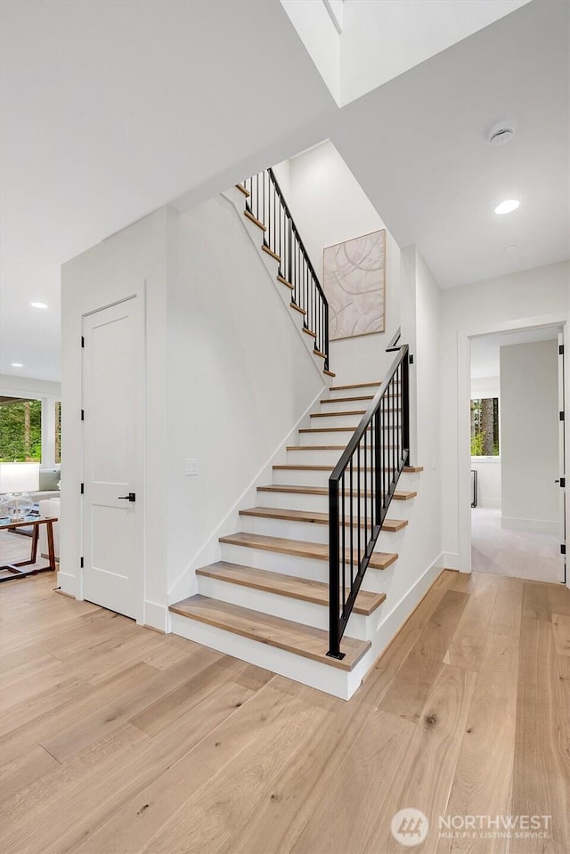 43268 SE 145th Pl, North Bend, WA 98045 - staircase featuring wood finished floors, recessed lighting, and baseboards