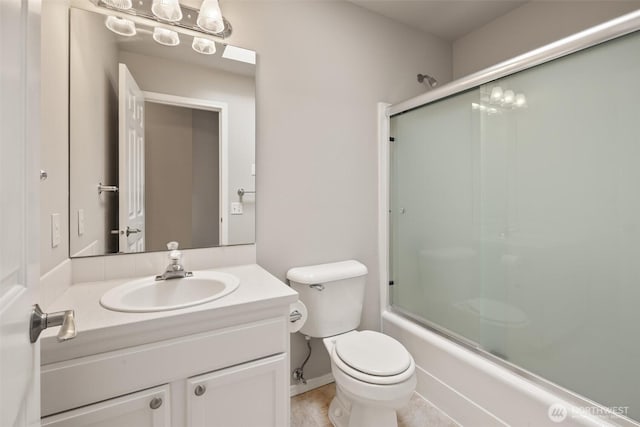 7521 Sterling Pl, Arlington, WA 98223 - full bath featuring toilet, vanity, and shower / bath combination with glass door