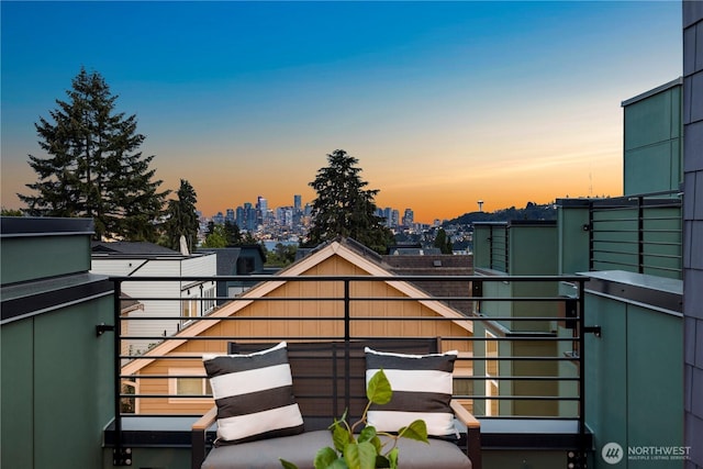 1523 N 39th St, Seattle, WA 98103 - balcony at dusk with a view of skyline