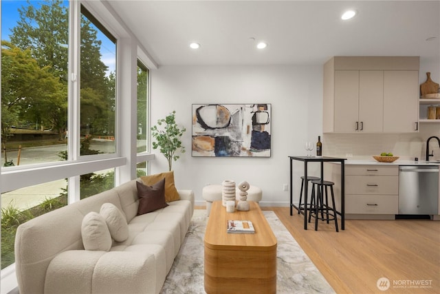 1523 N 39th St, Seattle, WA 98103 - living room with light wood-style flooring, recessed lighting, and wet bar