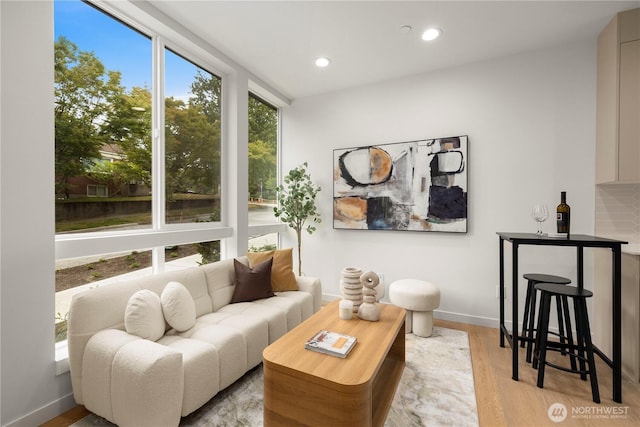1523 N 39th St, Seattle, WA 98103 - living area with light wood finished floors and recessed lighting
