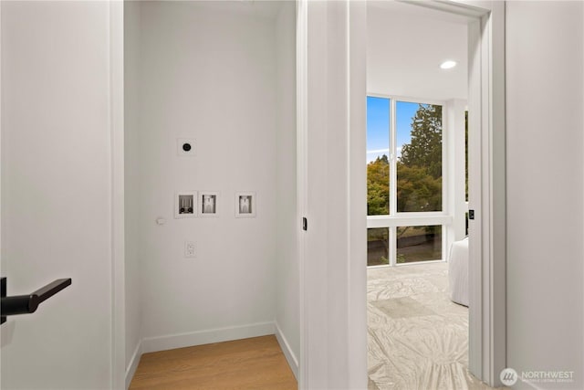 1523 N 39th St, Seattle, WA 98103 - laundry room featuring electric dryer hookup, washer hookup, recessed lighting, and light wood-style floors