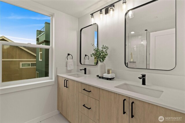 1523 N 39th St, Seattle, WA 98103 - full bath featuring double vanity and baseboards