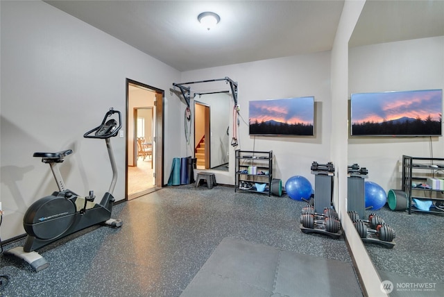 exercise area with baseboards