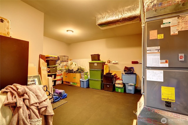 storage room featuring heating unit
