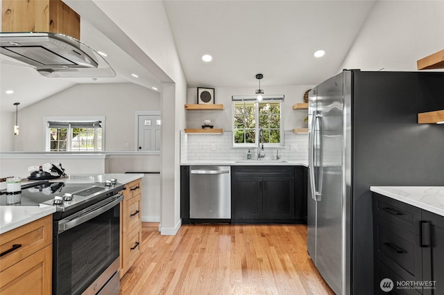 21 Hexon Rd, Selah, WA 98942 - kitchen featuring a sink, stainless steel appliances, open shelves, light wood-style flooring, and healthy amount of natural light