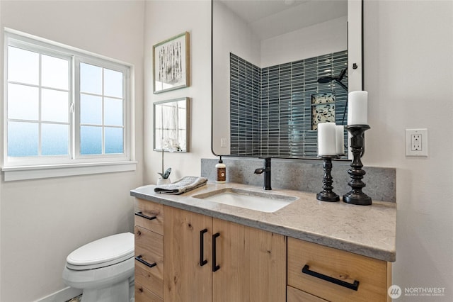 21 Hexon Rd, Selah, WA 98942 - bathroom with vanity, toilet, and baseboards