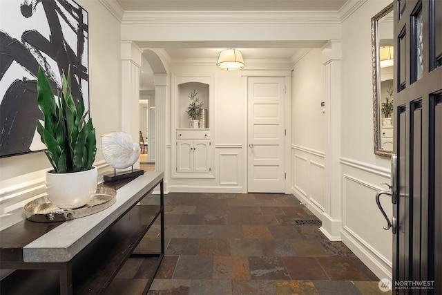 2249 78th Ave SE, Mercer Island, WA 98040 - doorway to outside with stone finish floors, arched walkways, and crown molding